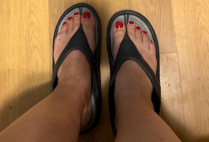 Using the comfortable shower flip-flops from Crocs