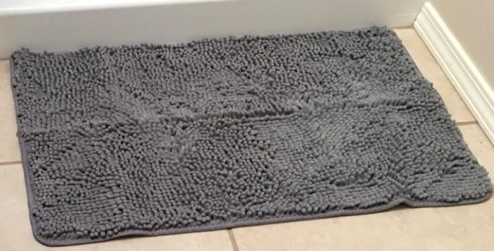 Inspecting how soft and comfortable the nonslip shower mats from Gorilla Grip
