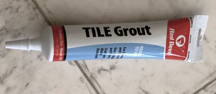 Showing Pre-Mixed Tile Grout Squeeze Tube from the brand Red Devil